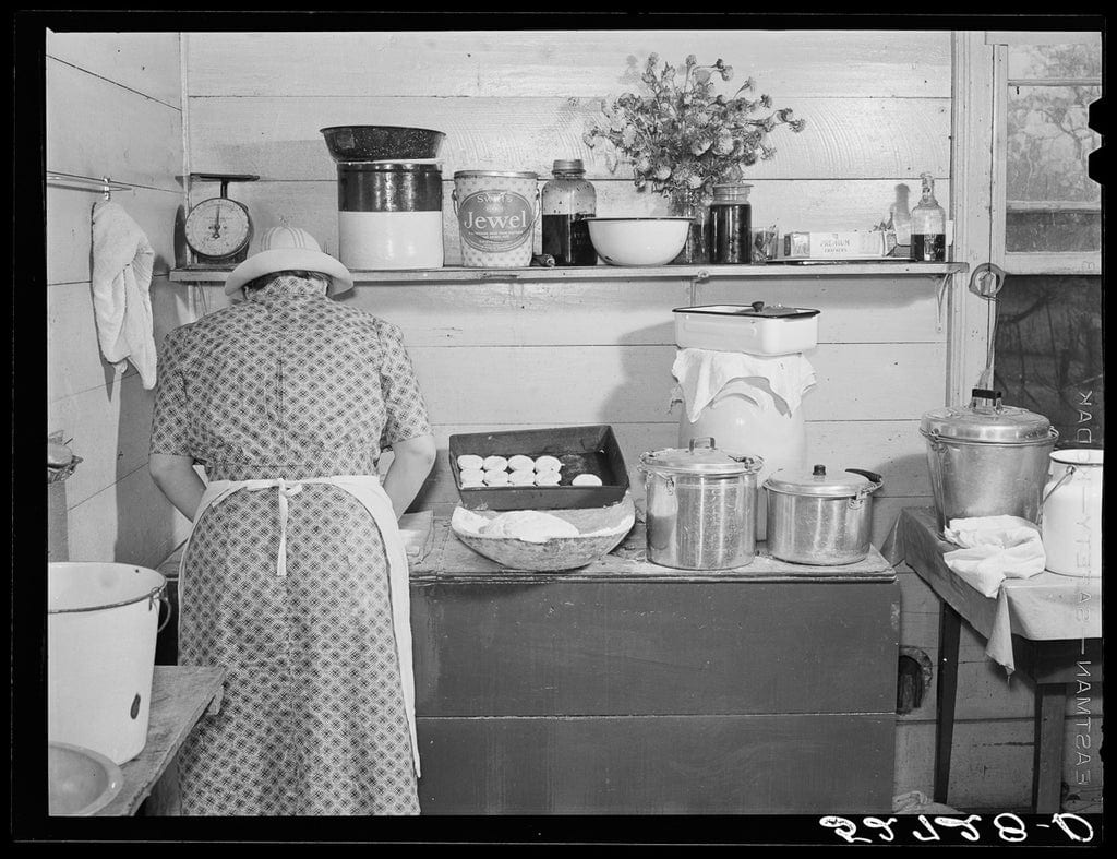 Marion Post Wolcott, Wilkins Family Making Biscuits, Garnville County, NC (1939); photograph by Walker Evans