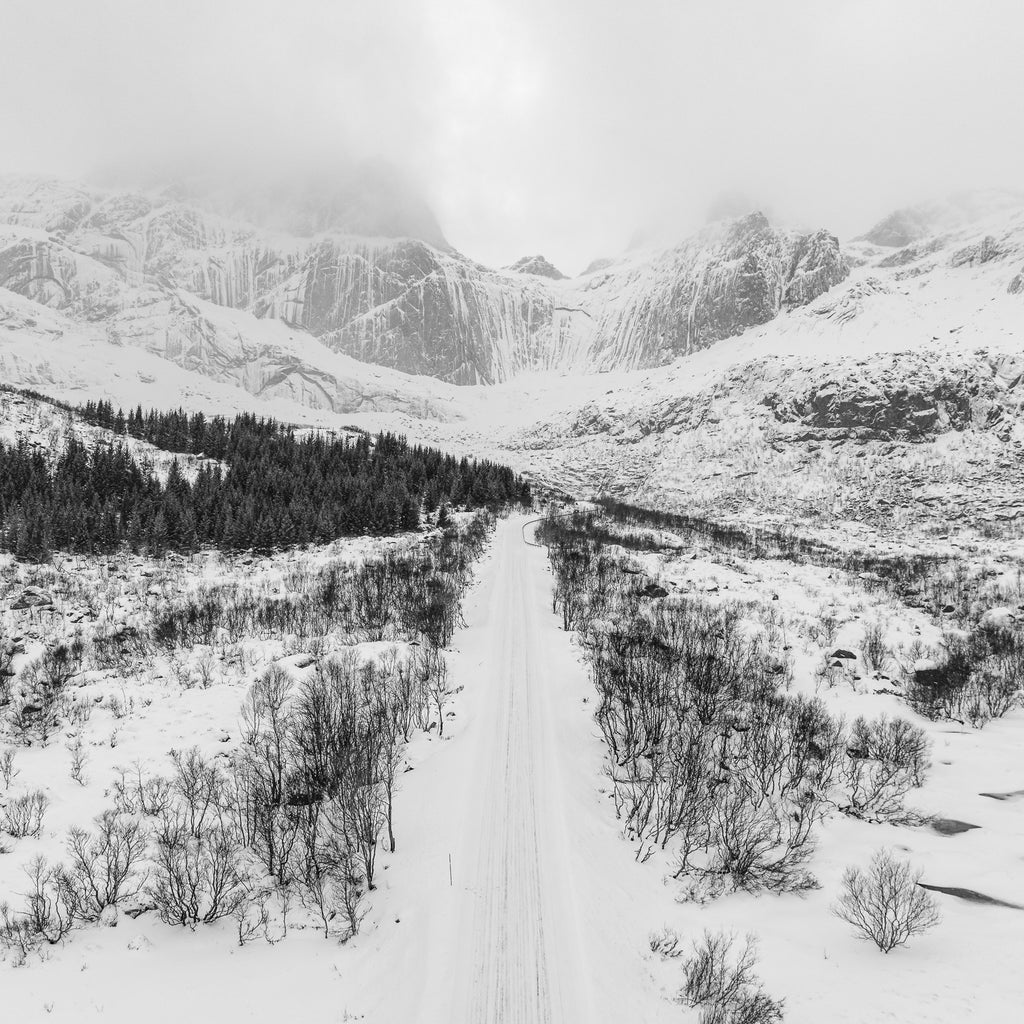 Snow Capped Peaks and Pathways in Norway