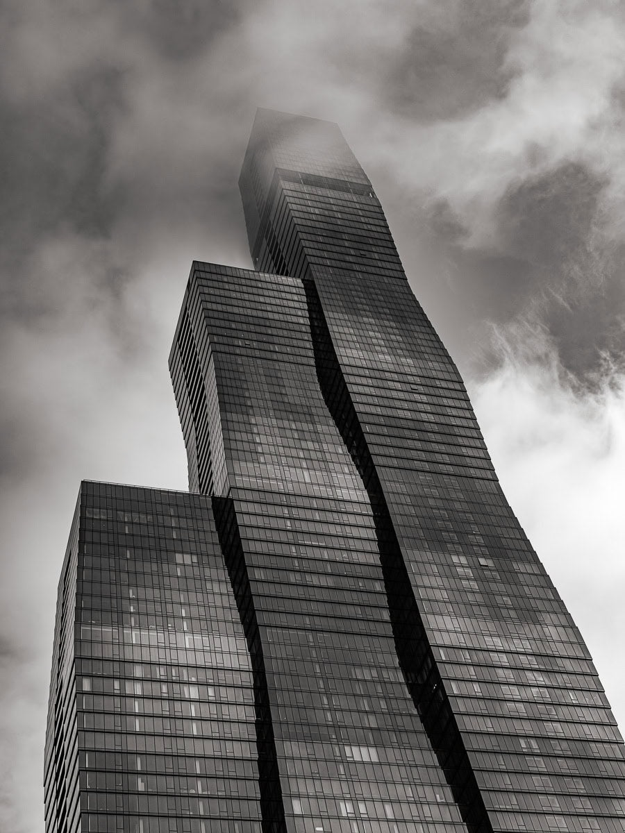 The modern curves of St. Regis Tower fade into the sky over Chicago.