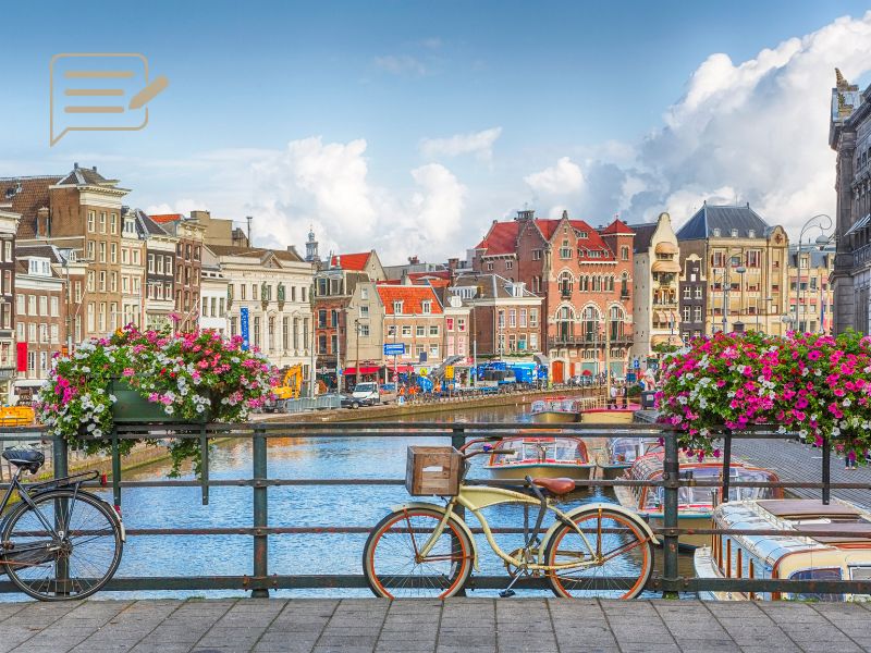 Bicycles parked along Amsterdam’s iconic canals in spring—explore the city like a local!
