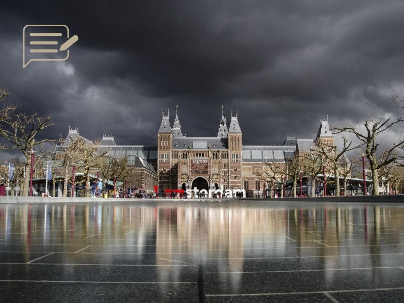 The iconic Rijksmuseum in Amsterdam during an autumn storm—perfect for capturing dramatic skies and reflections.