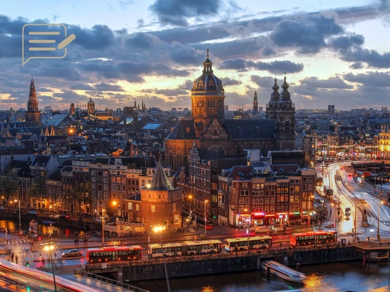 The stunning Amsterdam skyline at dusk—a perfect time for capturing the city’s beauty from above.