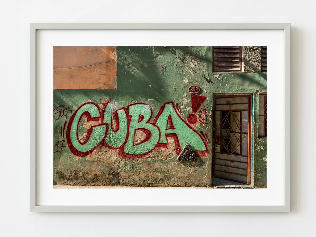 Cuba graffiti on an old house wall
