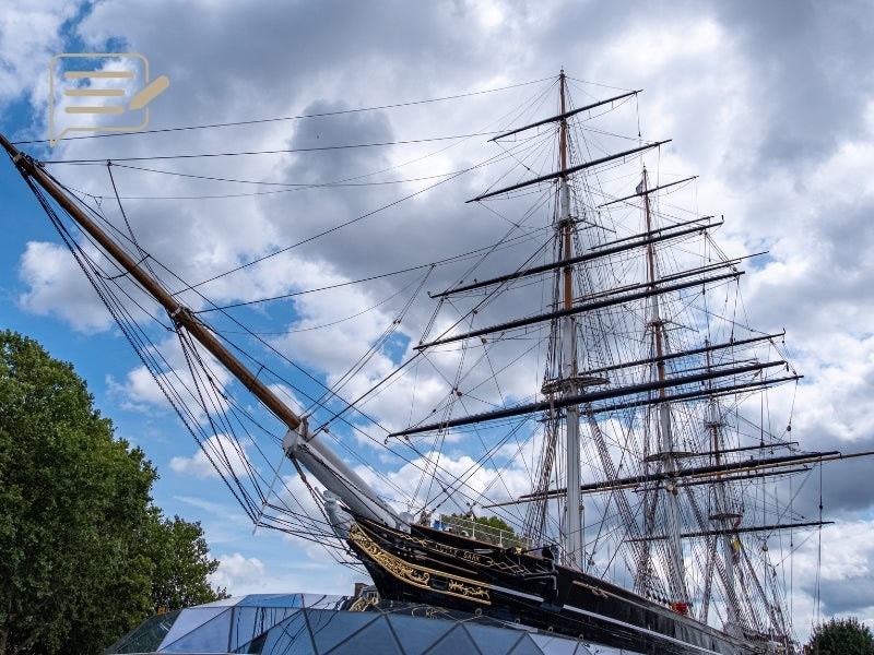 A stunning view of the Cutty Sark’s famous masts and intricate rigging, reaching into the skies above Greenwich. A testament to the ship’s historic seafaring legacy.