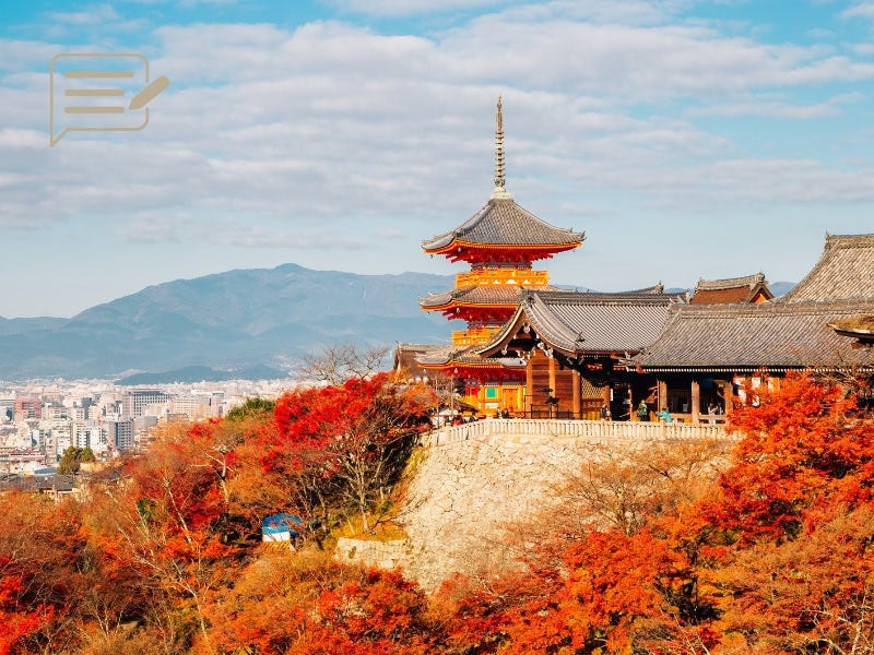 Kiyomizu-dera Temple in Kyoto during autumn – stunning views of red and orange foliage overlooking the city.