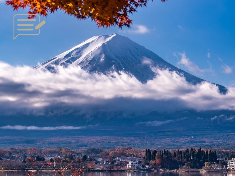 Majestic Mount Fuji with autumn foliage and clear skies, a must-see for fall travelers in Japan.