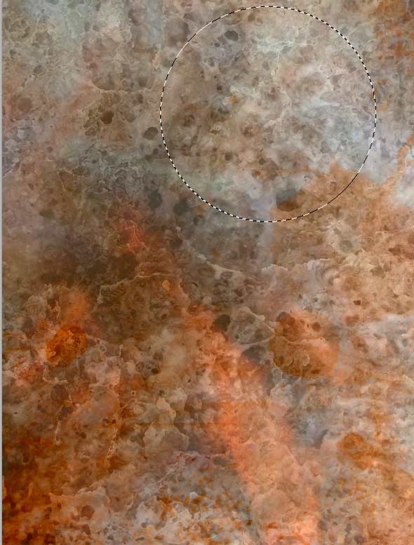 Select a circle from a good stony texture file. This is from Inthename_Stock on deviantArt. Isn't it wonderful? It's good enough to hang on the wall!